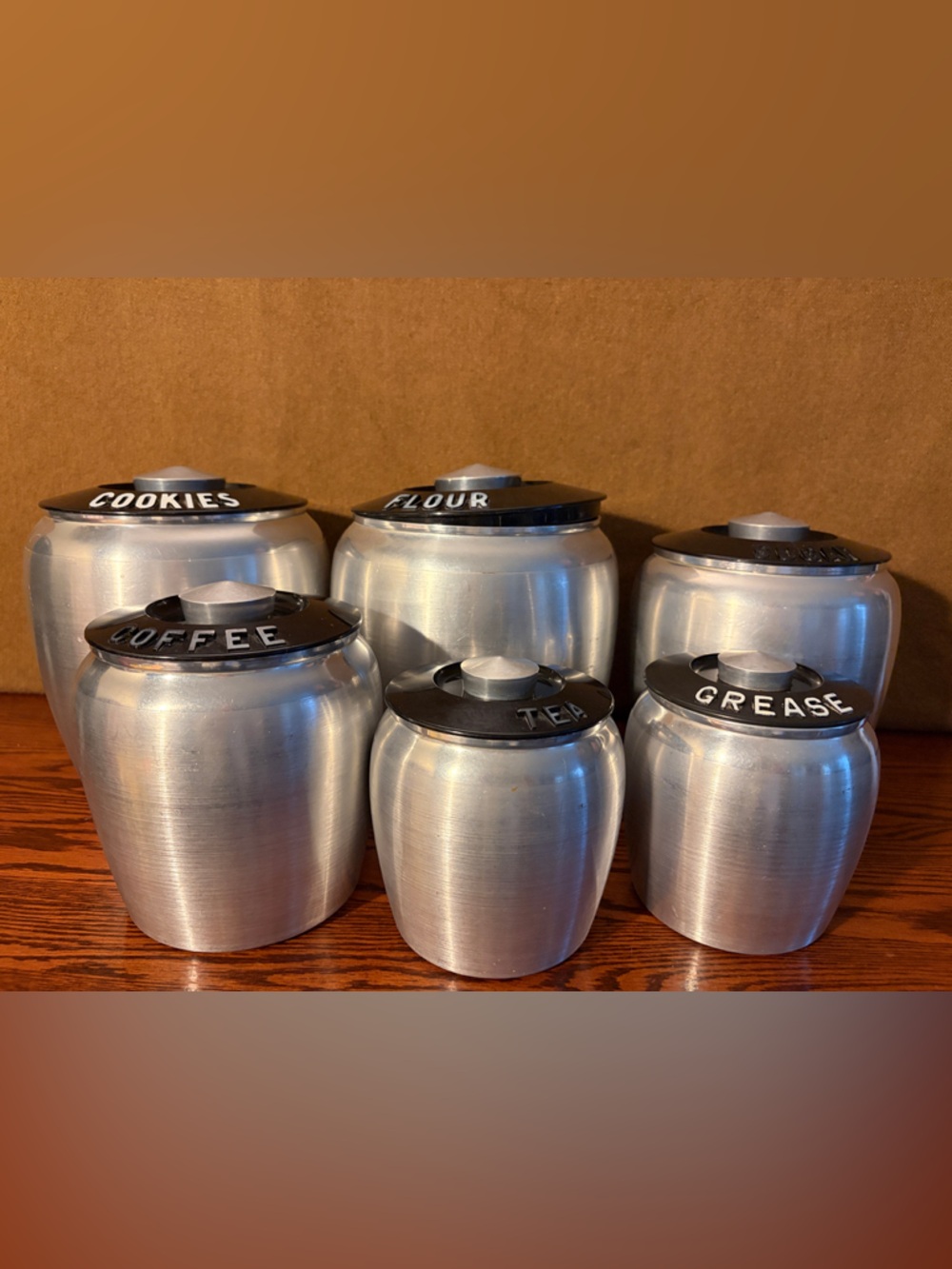 6 piece Kromex spun aluminum beehive canisters